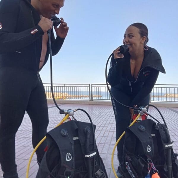 Group of open water students with instructor at the surface