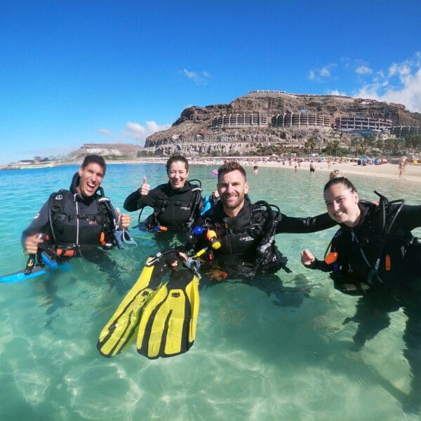 Group of try dive participants at the surface in Puerto Rico, Gran Canaria